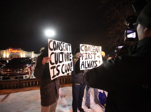 The media interviews three men, university students, as they hold signs saying "Consent First + Always" outside the Chapters parking lot at St. Vital Centre Saturday night rallying against rape culture and anyone that is for it.  They did not want their names or faces seen or used by the media. To go with Alex Paul's story on counter rape culture.    February 06, 2016 Ruth Bonneville / Winnipeg Free Press