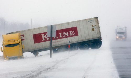 Blizzard conditions west of Winnipeg on Hyw 1 has sent a semi jackknifed across the highway making for dangerous conditions Sunday morning- Several other motorists have slid off the road between Portage La Prairie and Winnipeg. Breaking News- Feb 07, 2016   (JOE BRYKSA / WINNIPEG FREE PRESS)
