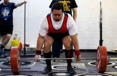 Mark Colley competes in the squat discipline during the Manitoba Powerlifting Association event at the Brickhouse Gym, Saturday, February 6, 2016. The event was 3 events, bench press, squat and deadlift. (TREVOR HAGAN/WINNIPEG FREE PRESS)