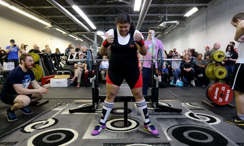 Alyssa Amanda Burg gets herself pumped up before attempting the bench press during the Manitoba Powerlifting Association event at the Brickhouse Gym, Saturday, February 6, 2016. The event was 3 events, bench press, squat and deadlift. (TREVOR HAGAN/WINNIPEG FREE PRESS)