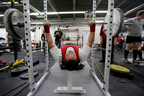 Mark Colley warms up prior to the bench press event during the Manitoba Powerlifting Association event at the Brickhouse Gym, Saturday, February 6, 2016. The event was 3 events, bench press, squat and deadlift. (TREVOR HAGAN/WINNIPEG FREE PRESS)
