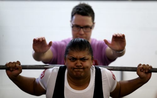 Alyssa Amanda Burg competes in the squat during the Manitoba Powerlifting Association event at the Brickhouse Gym, Saturday, February 6, 2016. The event was 3 events, bench press, squat and deadlift. (TREVOR HAGAN/WINNIPEG FREE PRESS)