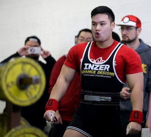 Olimar Gutierrez prepares for a lift during the Manitoba Powerlifting Association event at the Brickhouse Gym, Saturday, February 6, 2016. The event was 3 events, bench press, squat and deadlift. (TREVOR HAGAN/WINNIPEG FREE PRESS)