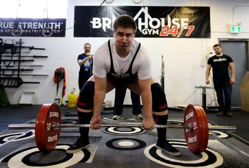 Danill Naumov competes in the dead lift during the Manitoba Powerlifting Association event at the Brickhouse Gym, Saturday, February 6, 2016. The event was 3 events, bench press, squat and deadlift. (TREVOR HAGAN/WINNIPEG FREE PRESS)