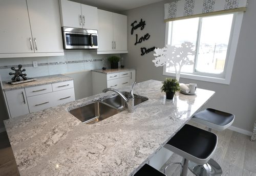 Homes. 601 Sage Creek Boulevard in Sage Creek. The island in the kitchen area. The Kensington Homes sales rep. is Rene Giroux,  Todd Lewys story Wayne Glowacki / Winnipeg Free Press Feb.8 2016