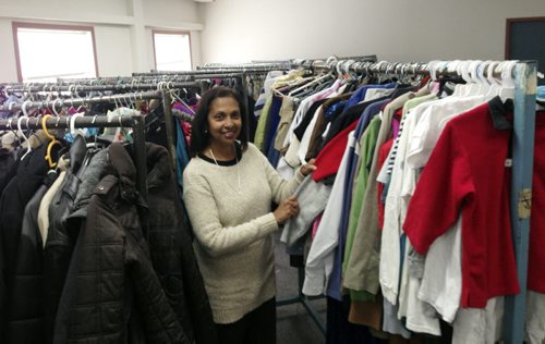 Carol Sanders / Winnipeg Free Press  Yasmin Ali, president of the Canadian Muslim Women's Institute, in the former multi-purpose room that's now full of clothes. February 8, 2016
