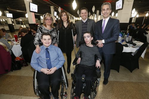 February 8, 2016 - 160208  -  Maria Marrone, COO, SMD Foundation (from left), Spencer Lambert, SMD youth ambassador, Sandi Reimer, SMD adult ambassador, Mayor Brian Bowman, Mitchell Potter, SMD youth ambassador, and Keith Potter at the SMD Foundation Attire to Aspire fashion show fundraiser at the Assiniboia Downs Monday, February 8, 2016.  John Woods / Winnipeg Free Press