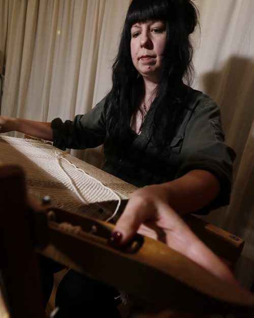 February 1, 2016 - 160201  - Kelly Ruth plays her loom during a rehersal in her home Monday February 1, 2016. Ruth, a textile artist, who not only weaves on her loom has turned it into a musical instrument, by amplifying it and "playing" it while she works. Kelly is part of a three-piece group mad up of a bassoon, cello and loom. John Woods / Winnipeg Free Press