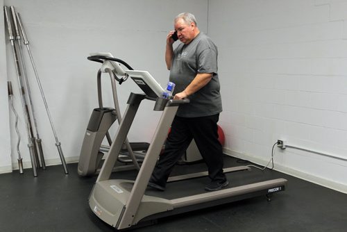 President of the Manitoba Metis Federation David Chartrand recently suffered a mini stroke in Paris, France. Gord Sinclair is doing a story on his new outlook on life. He has a treadmill in the office he works out on. BORIS MINKEVICH / WINNIPEG FREE PRESS February 9, 2016