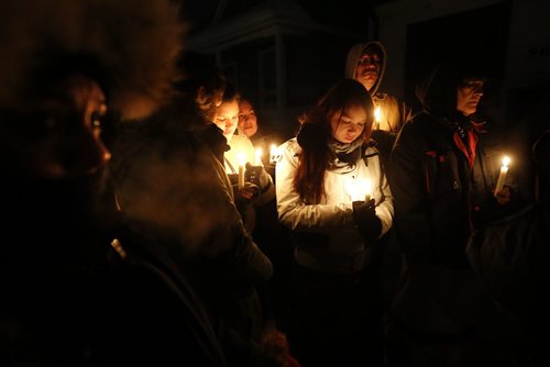 February 9, 2016 - 160209  -  Family gather outside 556 Stella Avenue to remember Winnipeg's latest murder victim Mavis Ducharme Tuesday, February 9, 2016.  John Woods / Winnipeg Free Press