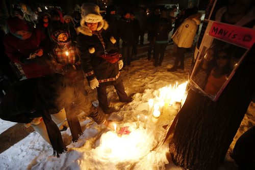 February 9, 2016 - 160209  -  Friends and family gather outside 556 Stella Avenue to remember Winnipeg's latest murder victim Mavis Ducharme Tuesday, February 9, 2016.  John Woods / Winnipeg Free Press