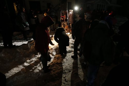 February 9, 2016 - 160209  -  Friends and family gather outside 556 Stella Avenue to remember Winnipeg's latest murder victim Mavis Ducharme Tuesday, February 9, 2016.  John Woods / Winnipeg Free Press