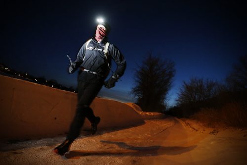 February 9, 2016 - 160209  -  Alain Dupuis, an ultra marathoner, will be competing in the Actif Epica on Saturday is photographed as he runs along the Red River Tuesday, February 9, 2016. The race is a gruelling 125 km run along parts of the Trans Canada Trail through rough terrain and outdoors in the cold.   John Woods / Winnipeg Free Press