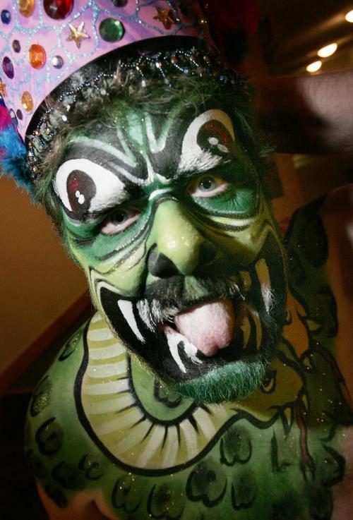 John Woods / Winnipeg Free Press / February 15, 2008 - 080215 - Doug Speirs got body painted by Lucie Brouillard at the Convention Centre Friday February 15, 2008. Shelby is recovering from cancer