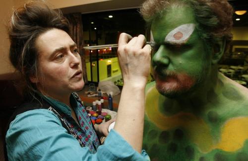 John Woods / Winnipeg Free Press / February 15, 2008 - 080215  - Doug Speirs got body painted by Lucie Brouillard at the Convention Centre Friday February 15, 2008.   Shelby is recovering from cancer
