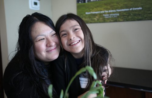 Twelve-year-old  Allexis Siebrecht, who received a liver transplant in 2015,  is all smiles while hanging out with her  mom, Liz Siebrecht, at press conference at the Kidney Foundation Wednesday.    The Kidney Foundation held press conference to bring awareness to the idea of changing the organ donor policy in Manitoba to presumed consent at press conference Wednesday. See Alex Paul story.  February 10, 2016 Ruth Bonneville / Winnipeg Free Press