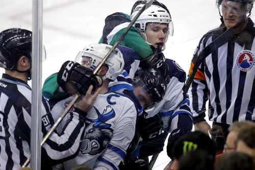 SPORTS - Manitoba Moose vs. Texas Stars at the MTS Centre in Winnipeg. A tangle of players up against the boards in thirst period action. BORIS MINKEVICH / WINNIPEG FREE PRESS February 10, 2016