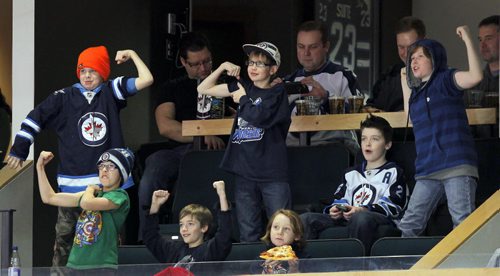 SPORTS - Manitoba Moose vs. Texas Stars at the MTS Centre in Winnipeg. Som youngsters try to win the Flex Cam contest where they flex their muscles. BORIS MINKEVICH / WINNIPEG FREE PRESS February 10, 2016