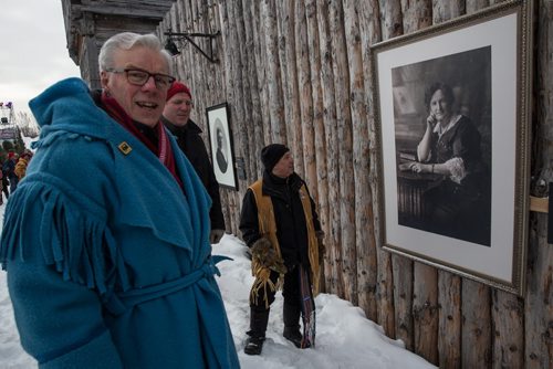 Mike Deal / Winnipeg Free Press Officials were invited to check out the grounds of the Festival du Voyageur the day before it's official opening and to have a look at the outdoor exhibition curated by the CMHR, Let Them Howl: 100 Years in the Women's Rights Struggle. Manitoba's Premier Greg Selinger and St. Boniface MP Dan Vandal check out the large portrait of Nellie McClung hung on the outside of Fort Gibraltar as part of the CMHR exhibit. 160211 - Thursday, February 11, 2016