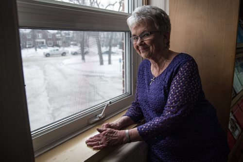 Mike Deal / Winnipeg Free Press A tour of the Rehabilitation Centre for Children on Wellington Crescent which is moving to a new location this coming spring.  Marge Wright who arrived at the Centre in 1949 as an 11-yr-old patient recovering from surgery to her back, looks out the window that sat over her bed. 160211 - Thursday, February 11, 2016