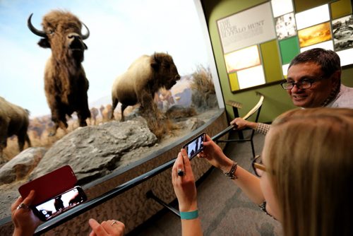 Sisters, Kathryn and Karolyn Maslanka getting tips from Ralph Croning during Safari Night at the Manitoba Museum, where people were taking guided tours with photography tips, Thursday, February 11, 2016. (TREVOR HAGAN/WINNIPEG FREE PRESS)
