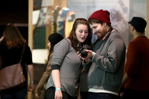 Kyle Monkman, 25, and Sarah West, 21, taking photos during Safari Night at the Manitoba Museum, where people were taking guided tours with photography tips, Thursday, February 11, 2016. (TREVOR HAGAN/WINNIPEG FREE PRESS)
