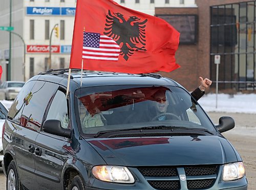 BORIS MINKEVICH / WINNIPEG FREE PRESS  080217 Winnipeg's Portage Ave. with Kosovo happy people.