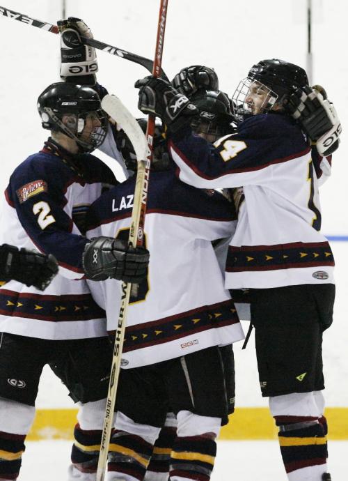 John Woods / Winnipeg Free Press / February 17, 2008 - 080217 - Winnipeg Thrashers Jesse Hall (22)(middle), Mark Stone (14), Robby Lazo (9), Mathew Bodie (2) celebrate Hall's goal in the third period against the Eastman Selects in Midget AAA hockey action at Gateway Arena Sunday February 17, 2008.   The Thrashers defeated the Selects ending the season with a perfect 40-0 record.