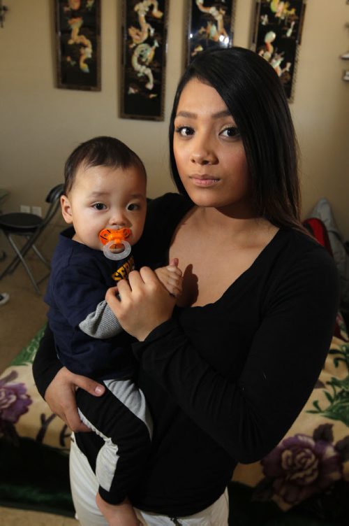 Caley Fawcett is a 17-year-old mom who was allegedly assaulted by transit bus driver. It was a she-said, she-said until video surveillance proved the bus driver had allegedly assaulted Fawcett first, and she defended herself. The bus driver has been suspended. In this photo Caley holds her 8 month old son Jharrell Faucett-Ramirez. BORIS MINKEVICH / WINNIPEG FREE PRESS February 12, 2016
