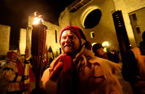 Dan Leclair, President of the Festival du Voyageur, at a candle and torch lit march from the Canadian Museum for Human Rights to the St.Boniface Cathedral, to mark the opening of the Festival du Voyageur, Friday, February 12, 2016. (TREVOR HAGAN/WINNIPEG FREE PRESS)