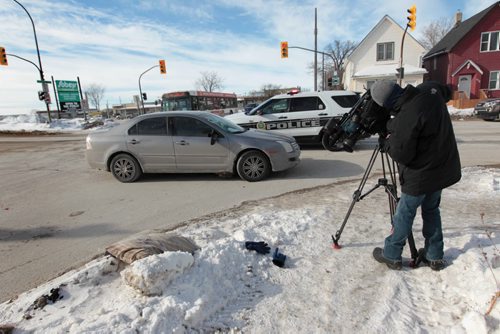 A bloodied glove and pillow were left at the scene of a car accident involving a pedestrian at the corner of Arlington and Dufferin Ave. Saturday.  Victim was sent to hospital in serious condition.     February 13, 2016 Ruth Bonneville / Winnipeg Free Press MVC