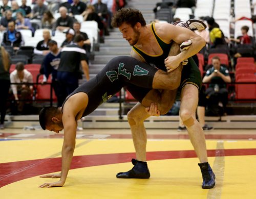 University of Regina's Gaelan Malloy, right, defeats University of Fraser Valley's Devin Purewall, during wresting during the Canada West Wrestling Championships at the University of Winnipeg, Saturday, February 13, 2016. (TREVOR HAGAN/WINNIPEG FREE PRESS)