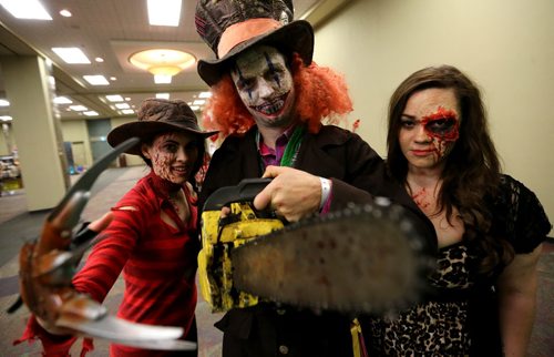 Krystall Levesque "Kitty Cadaver," Brad Chammartin "Buster the Clown" and Chrissie Hayes "Kat a Tonic" during the Central Canada Comic Con (C4) 1st Annual St. Valentine's Horror Con at the Winnipeg Convention Centre, Saturday, February 13, 2016. (TREVOR HAGAN/WINNIPEG FREE PRESS)
