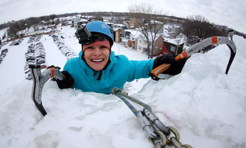 Yuliya Voronkova conquers the ice tower at Club D'Escalade de St-Boniface near the Festival du Voyageur park, Sunday, February 14, 2016. (TREVOR HAGAN/WINNIPEG FREE PRESS)