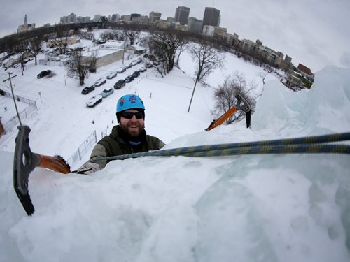 Tony Torka climbs the ice tower at Club D'Escalade de St-Boniface near the Festival du Voyageur park, Sunday, February 14, 2016. (TREVOR HAGAN/WINNIPEG FREE PRESS)