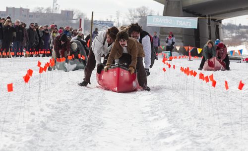 Mike Deal / Winnipeg Free Press Contestants take part in the first annual Wild Winter Canoe Race at The Forks on Louis Riel Day. 160215 - Monday, February 15, 2016