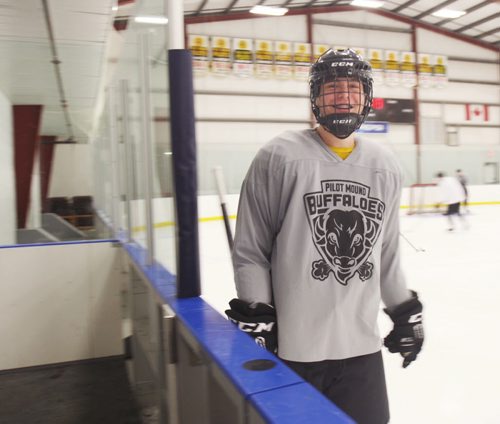 JOE BRYKSA / WINNIPEG FREE PRESS Pilot Mound, Manitoba , Pilot Mound Hockey Academy- Home of Pilot Mound Buffaloes- Player Carson McConnell smiles as he heads out on the rink, February 16, 2016.( See Randy Turner rural hockey rinks 49.8 story)