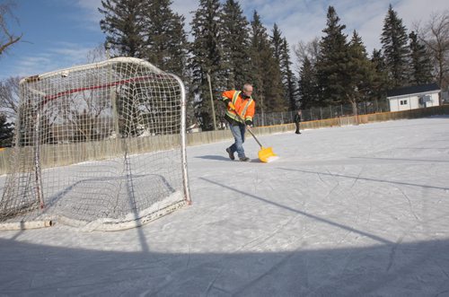 JOE BRYKSA / WINNIPEG FREE PRESS Manitou, Manitoba, Claire Jago cleans the ice on the Pembina Manitou outdoor rink, February 16, 2016.( See Randy Turner rural hockey rinks 49.8 story)