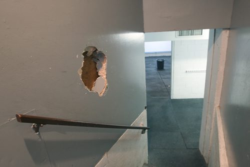 JOE BRYKSA / WINNIPEG FREE PRESS Manitou, Manitoba, Hole punched in wall on the way to the dressing rooms inside the Manitou Community Arena timers booth, February 16, 2016.( See Randy Turner rural hockey rinks 49.8 story)