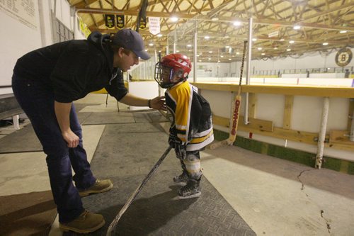 JOE BRYKSA / WINNIPEG FREE PRESS Pierson, Manitoba, Pierson, Manitoba- Rohan Pettinger with his father xxxx inside the arena after a long skate, February 16, 2016.( See Randy Turner rural hockey rinks 49.8 story)