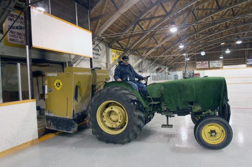 JOE BRYKSA / WINNIPEG FREE PRESSKenton, Manitoba, Blair Fordyce runs a old tractor and ice maker inside the arena in town, February 16, 2016.( See Randy Turner rural hockey rinks 49.8 story)