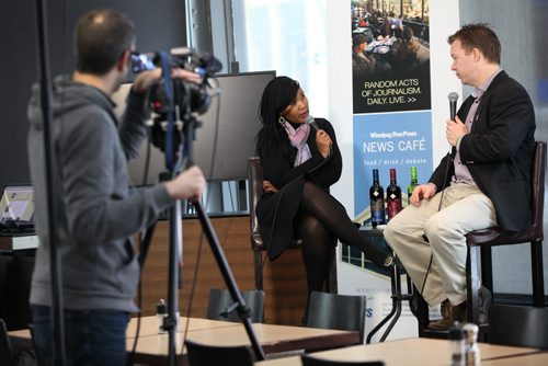Ruth Bonneville / Winnipeg Free Press Geoff Kirbyson interview's Nelson Mandel's granddaughter,Tukwini Mandela, in the News Cafe at live interview Wednesday (with Tyler Walsh on camera). February 17, 2016