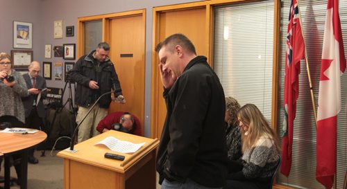 Ruth Bonneville / Winnipeg Free Press Cooper James Nemeth's dad,  Brent Nemeth, with his wife, Gaylene seated, answers questions from the media during at a Winnipeg police news conference on Wednesday, Feb 17, 2016.  Cooper James Nemeth, 17, was last seen in the Valley Gardens area early Sunday morning.