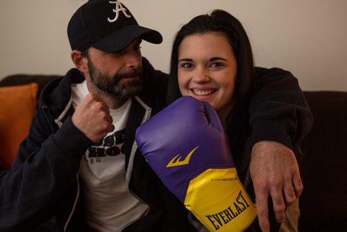 MIKE DEAL / WINNIPEG FREE PRESS Calli Vanderaa, 17, and her dad Corey in their home. Calli has taken up boxing since she was shot last year. See Gord Sinclair story 160217 - Wednesday, February 17, 2016