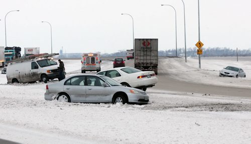 JOE BRYKSA / WINNIPEG FREE PRESSSix cars slid off the road on CentrePort Way about 1 km west of Oak Point Hyw  this morning in icy conditions , February 18, 2016.( Standup photo)