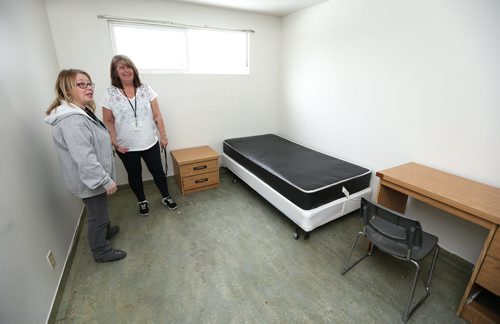 JASON HALSTEAD / WINNIPEG FREE PRESS L-R: Lisa Goss, executive director of Main Street Project, and Terri Fitzmaurice, team lead, check out a vacant room at Main Stay, the one-year transitional housing program at Main Street Project on Jan. 27, 2016. (See Social Page)