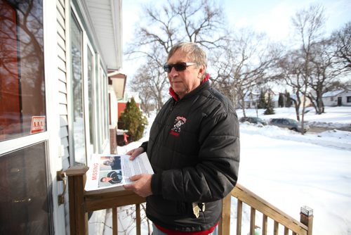 Ruth Bonneville / Winnipeg Free Press Father and grandfather, Ray Smylski, volunteers to drop off flyers containing information on missing teen, Cooper Nemeth, along Enfield Cresent Thursday afternoon.   See Jen Zoratti story.  Feb 18, 2016