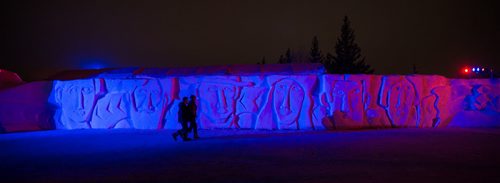 MIKE DEAL / WINNIPEG FREE PRESS Beautifully lit snow sculptures abound at the Festival du Voyageur on Thursday where temperatures hovered around 2C well into the night. 160218 - Thursday, February 18, 2016