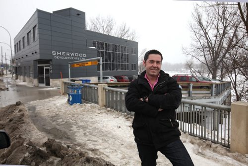 RUTH BONNEVILLE / WINNIPEG FREE PRESS Photographs of LOUIS PEREIRA, project manager for Sherwood Developments Ltd., who spent $2.4 million to renovate and convert a former Royal Canadian Legion,  that overlooks the river, into a multi-tenant office building on St. Mary's Rd. Photos also taken in lower-level where Sherwood Offices are located.  Section: Business/McNeill  February 19, 2016