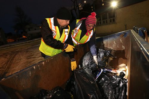 TREVOR HAGAN / WINNIPEG FREE PRESS Sgt. Pepper and Heather Baril, members of the Bear Clan as they search the North End for Cooper Nemeth, the missing 17 year old, Saturday, February 20, 2016.